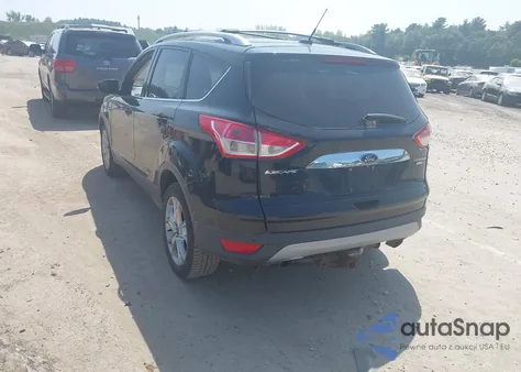 2016 Ford Escape Titanium z USA, uszkodzony, nr VIN 1FMCU9J95GUA72135